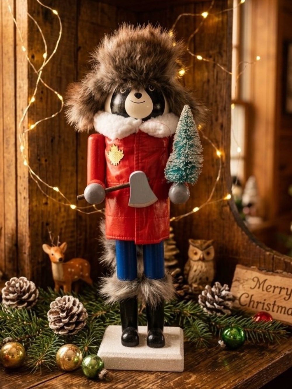 Woodland Nutcracker Figurine in Red Coat with Faux Fur Hat
Tree cutter! 13”